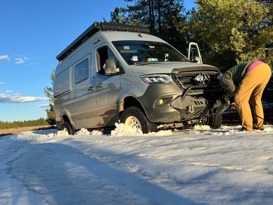 off road capable sprinter van doing snow recovery from wolf pack overland