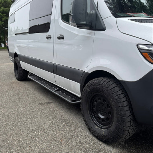roberts white custom luxury van 4500 sprinter with new side steps, air conditioner, suspension, tires and wheels from wolf pack overland