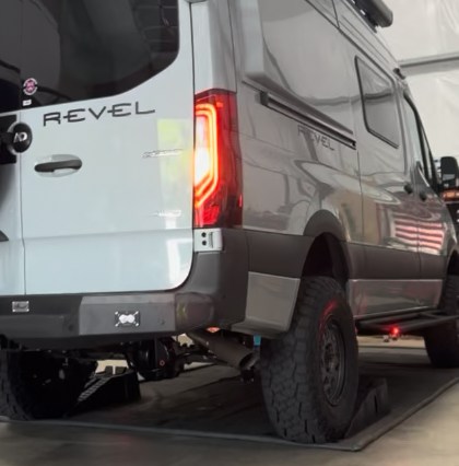 rear tire and leaf pack on a winnebago revel with owl falcon arrow pro suspension installed at wolf pack overland