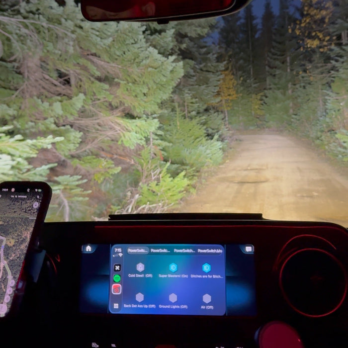 driving at night in a winnebago revel with upgraded headlights, baja lp6 lights on the bull bar, and lp4 lights on the a-pillar