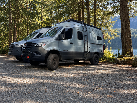 tiffin gh1 with suspension upgrades, fuel tank, side ladder, bumper, winch, baja lights and more installed at wolf pack overland