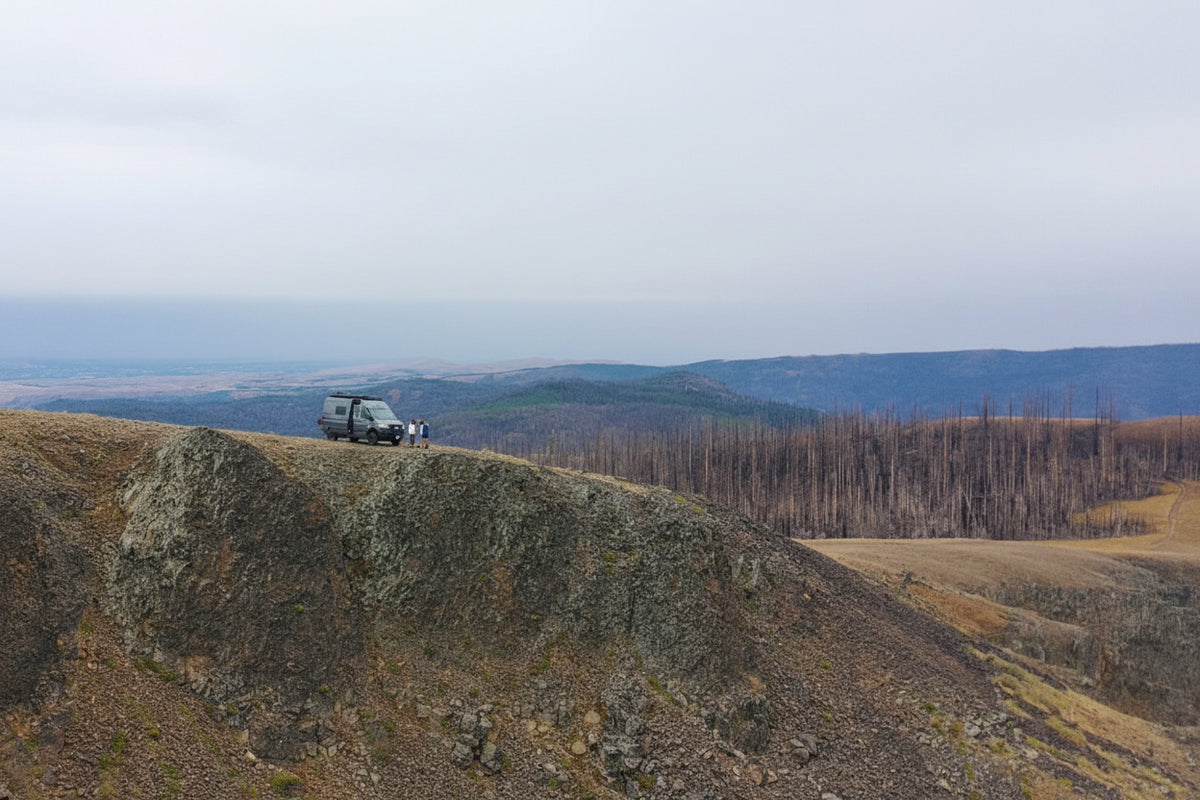 winnebageo revel on a mountain clif with air locker installed by wolf pack overland