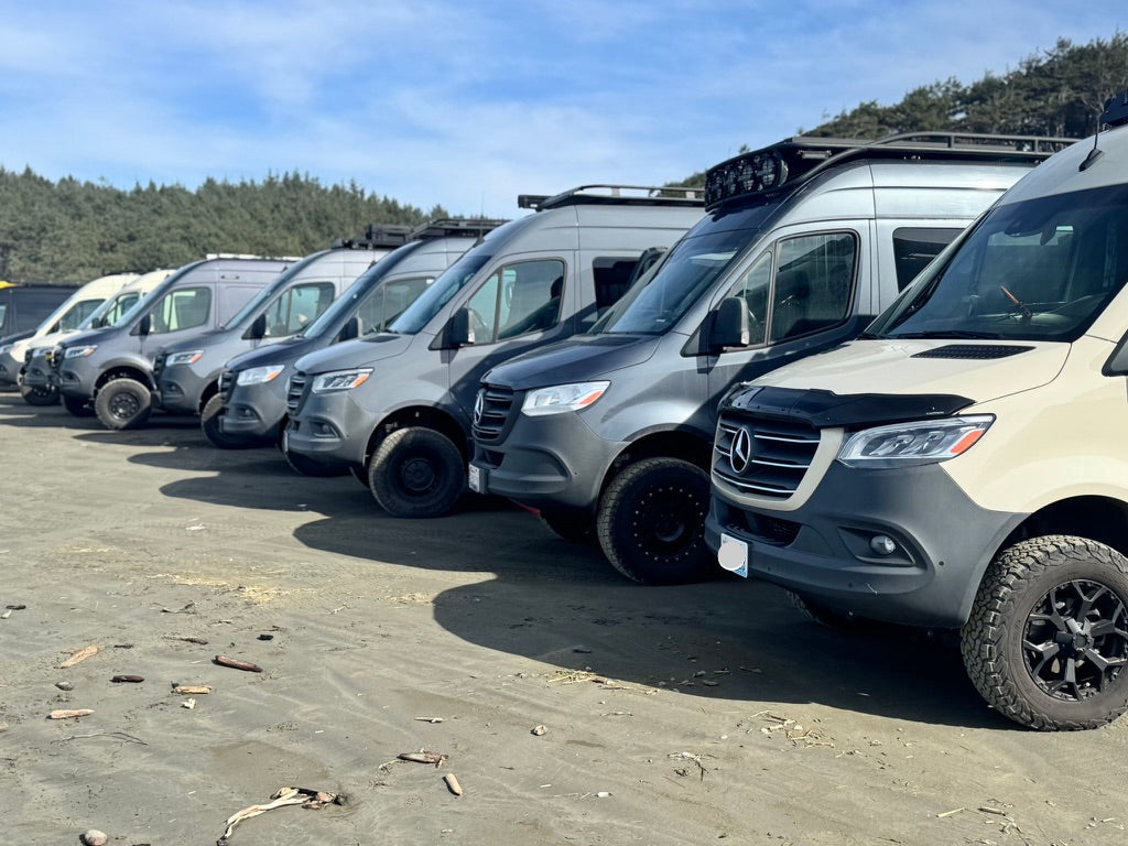 Wolf Pack vans on the beach in Washington