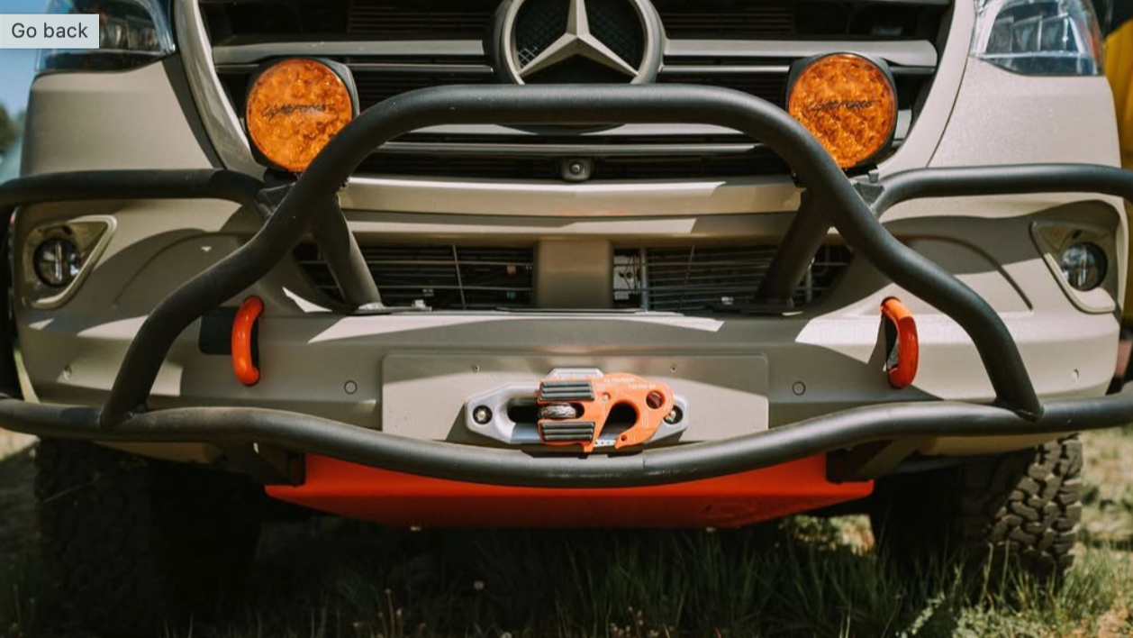 roambuilt bumper and orange color skid plate with lighting