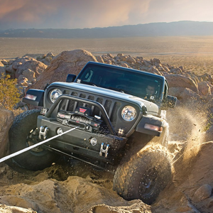 Warn VR EVO 12-S winch, parked on a rocky PNW trail, ready for off-road recovery