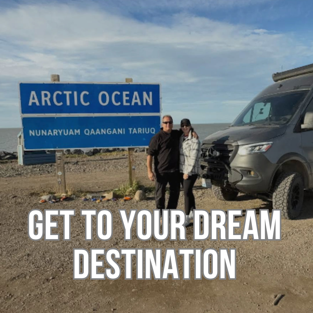 Wolf Pack travelers and their Revel at the Arctic Ocean sign