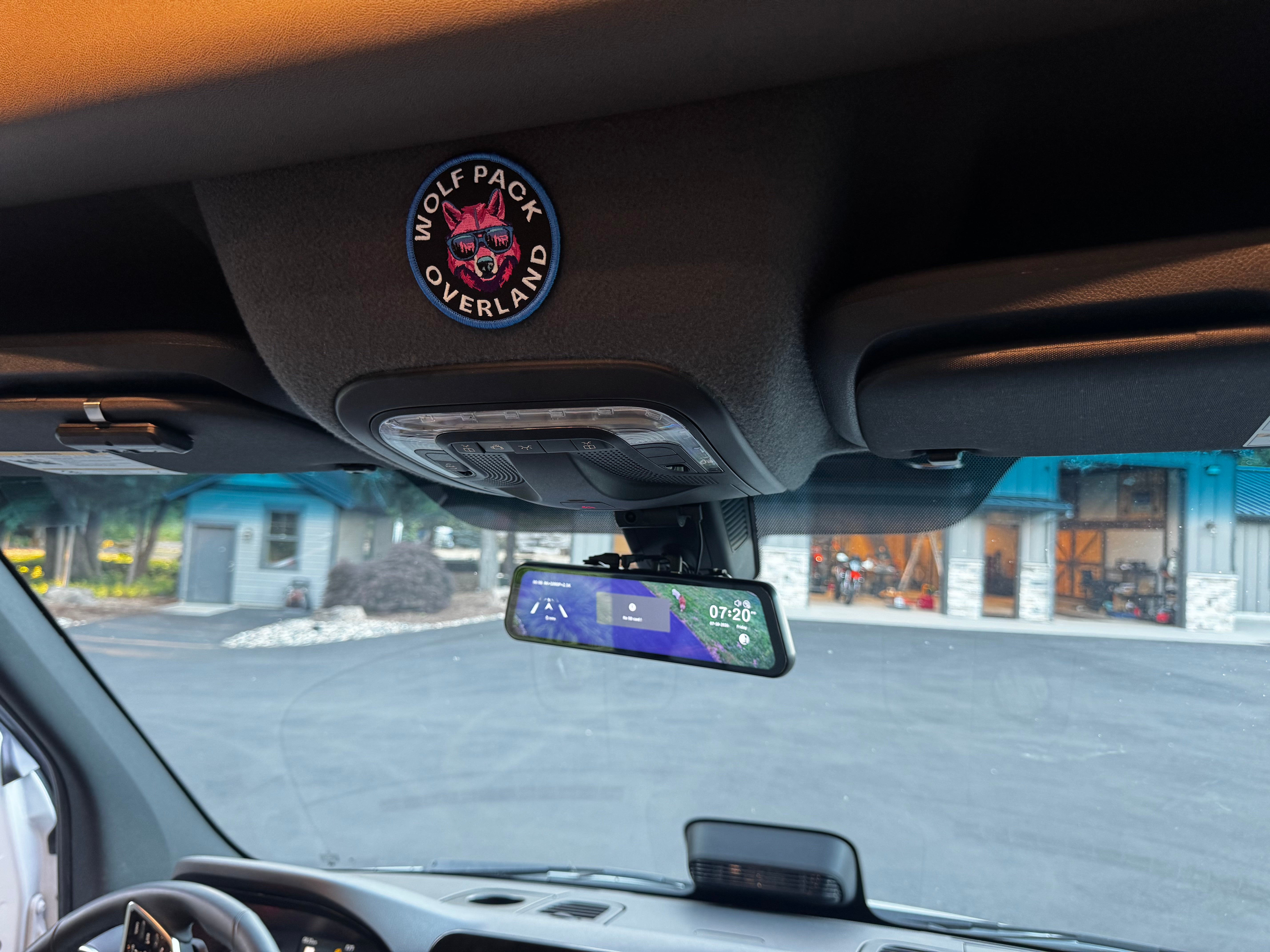 Wolfbox digital rearview camera mirror installed in a van by Wolf Pack Overland